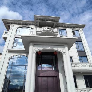 芜湖白麻别墅外墙干挂石材效果示例