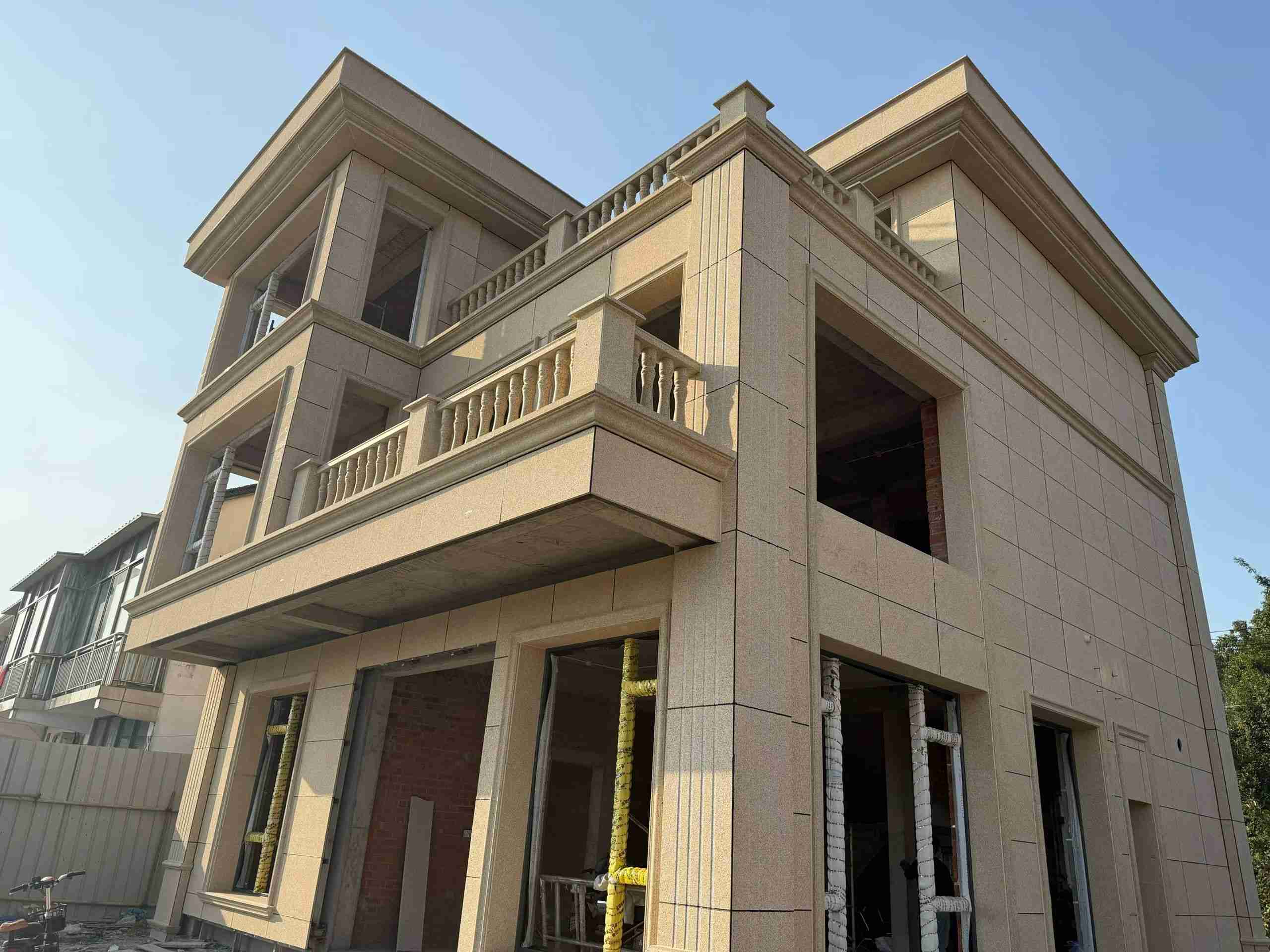 芜湖 黄金麻花岗岩石材荔枝面外墙干挂效果展示